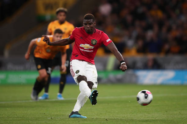 Pogba trở thành tội đồ với cú sút hỏng tai hại. Ảnh: Getty Images pogba, pogba sút hỏng, pogba penalty, Wolves vs MU, kết quả Wolves vs MU, kết quả Ngoại hạng Anh