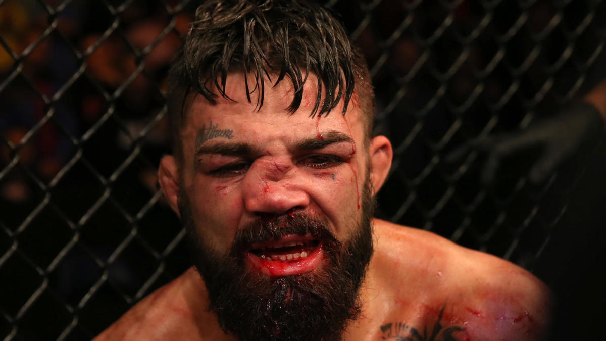 Gương mặt của Perry sau khi hứng trọn cú lên gối từ Luque võ sĩ, ufc, võ sĩ ufc, võ sĩ bị đánh, võ sĩ bị hạ knock-out
